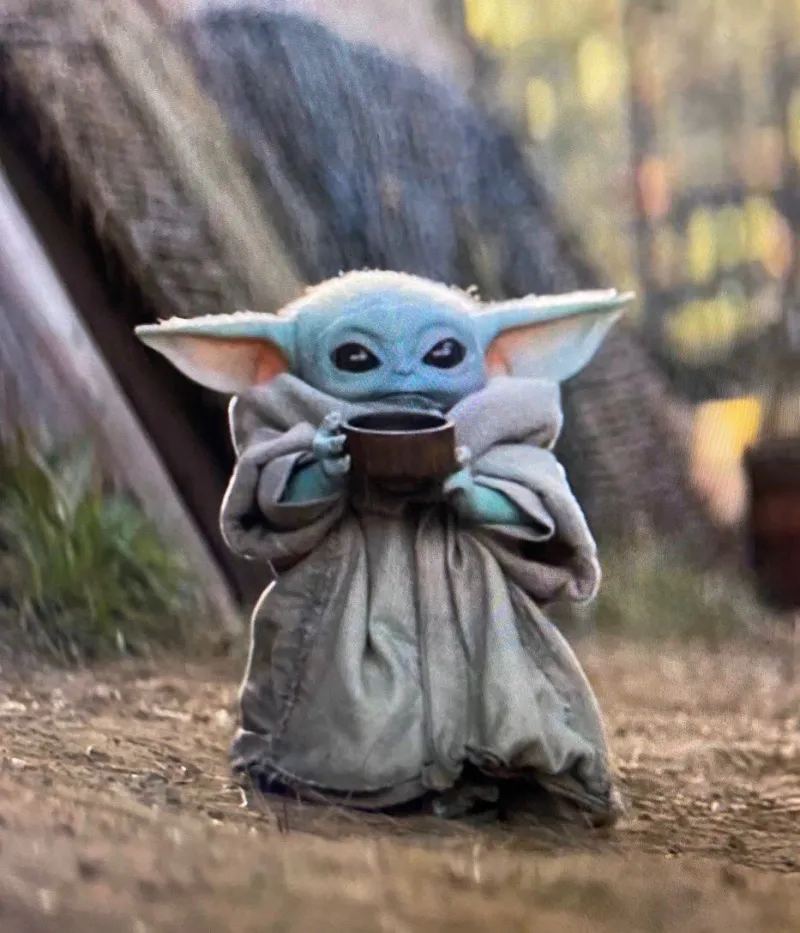 Baby Yoda drinking tea 