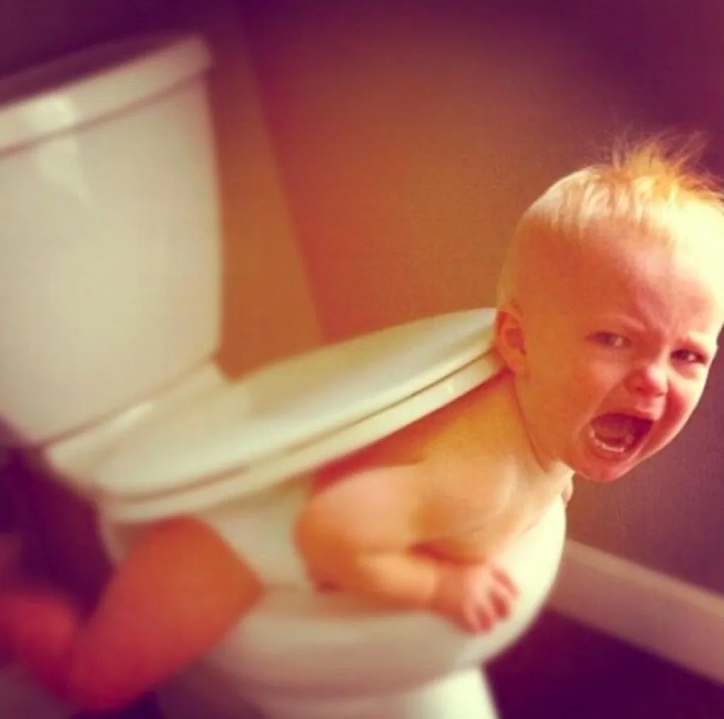 Baby stuck in toilet 