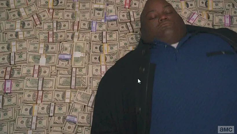 Fat guy laying on money 