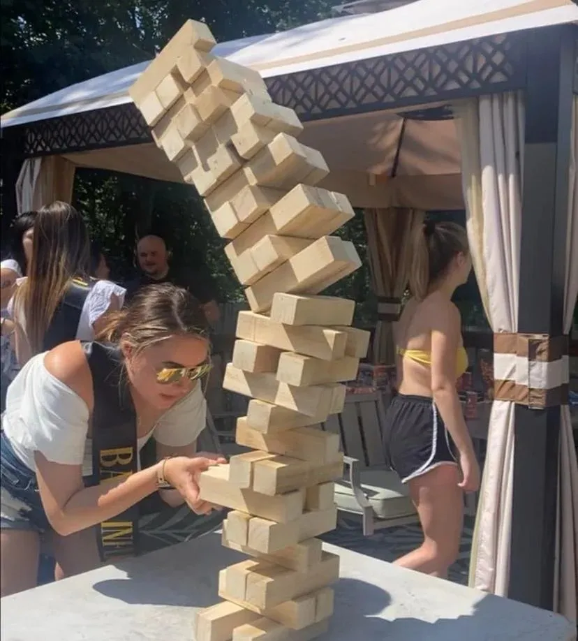 Girl jenga falling meme 