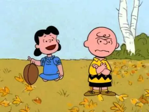 Lucy football and Charlie Brown 