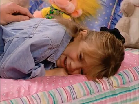 Michelle Crying on Bed 