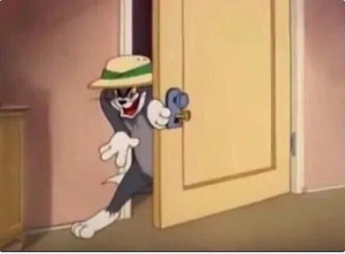 TOM SNEAKING IN A ROOM 