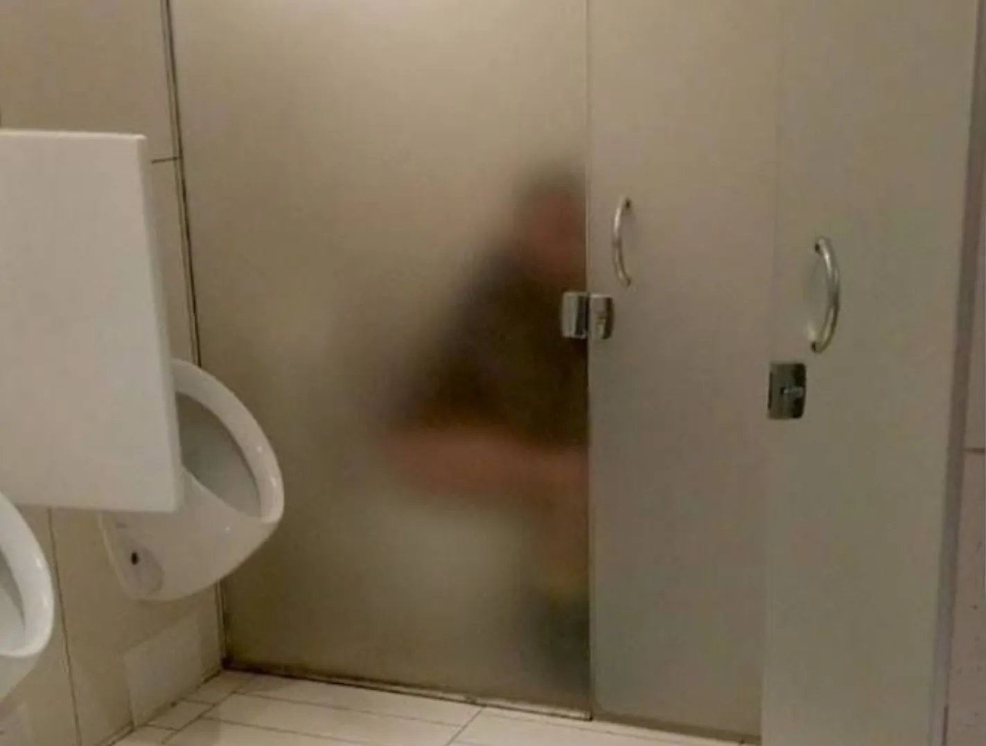 Toilet cubicle glass side 