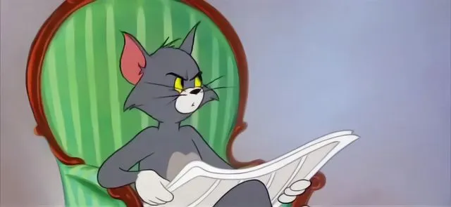 Tom Cat Reading a newspaper 