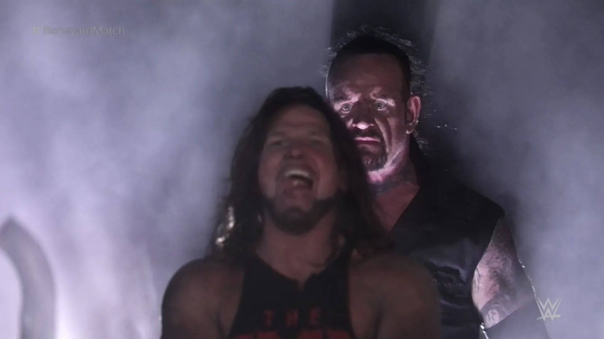 Undertaker teleports behind AJ Styles 