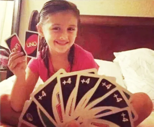 girl with two uno cards 