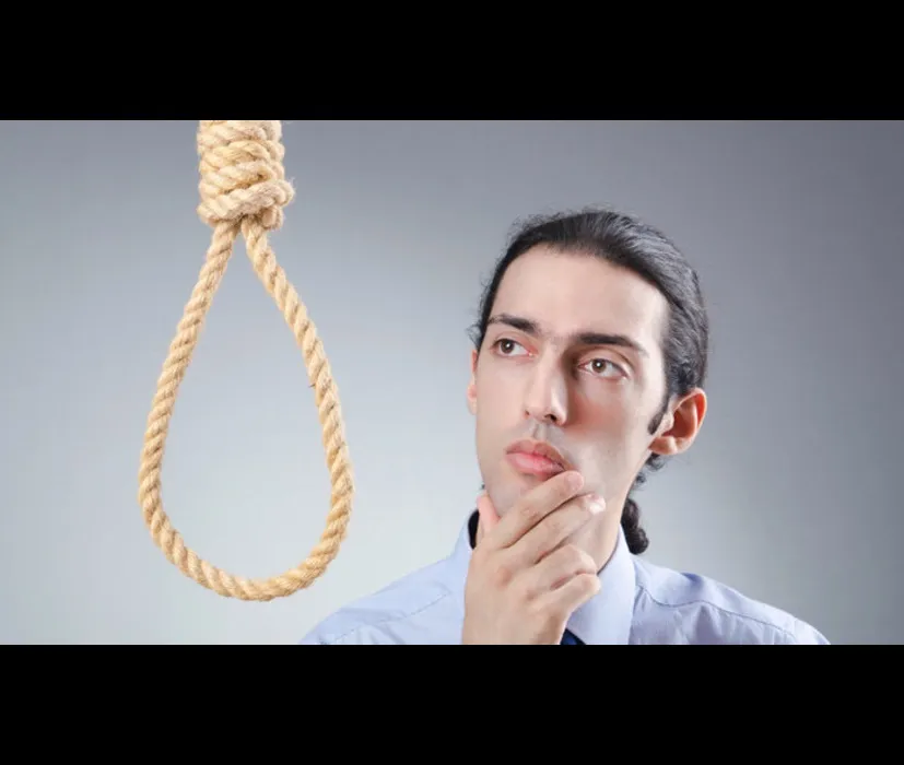 man pondering on hanging himself 