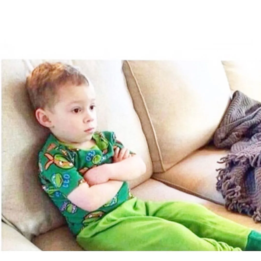 sad kid sitting 
